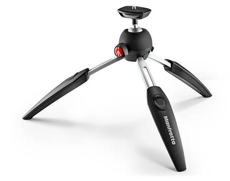 Manfrotto PIXI mini Desktop tripod perfect for larger lenses.